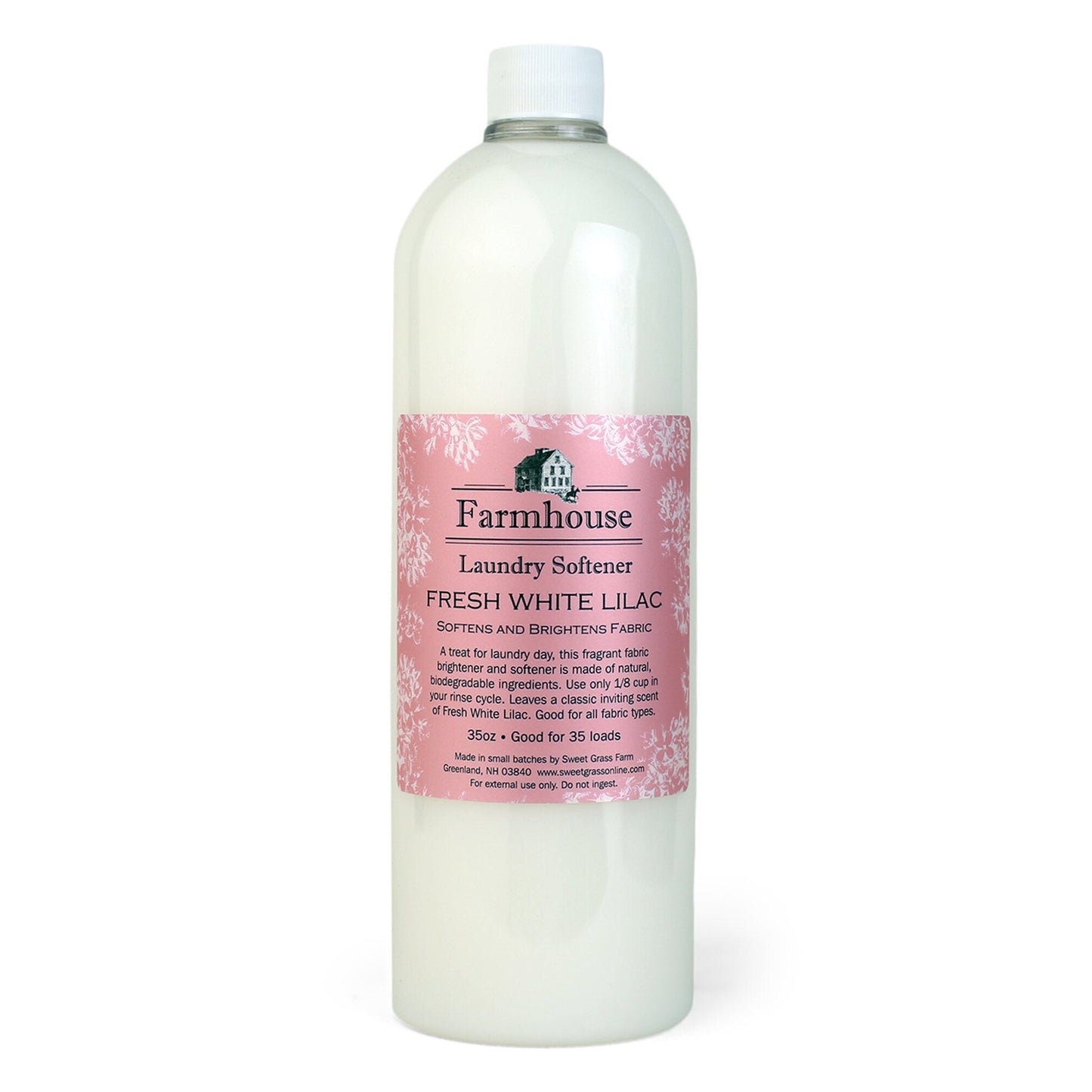 Bottle of Farmhouse Fresh White Lilac laundry softener on a white background