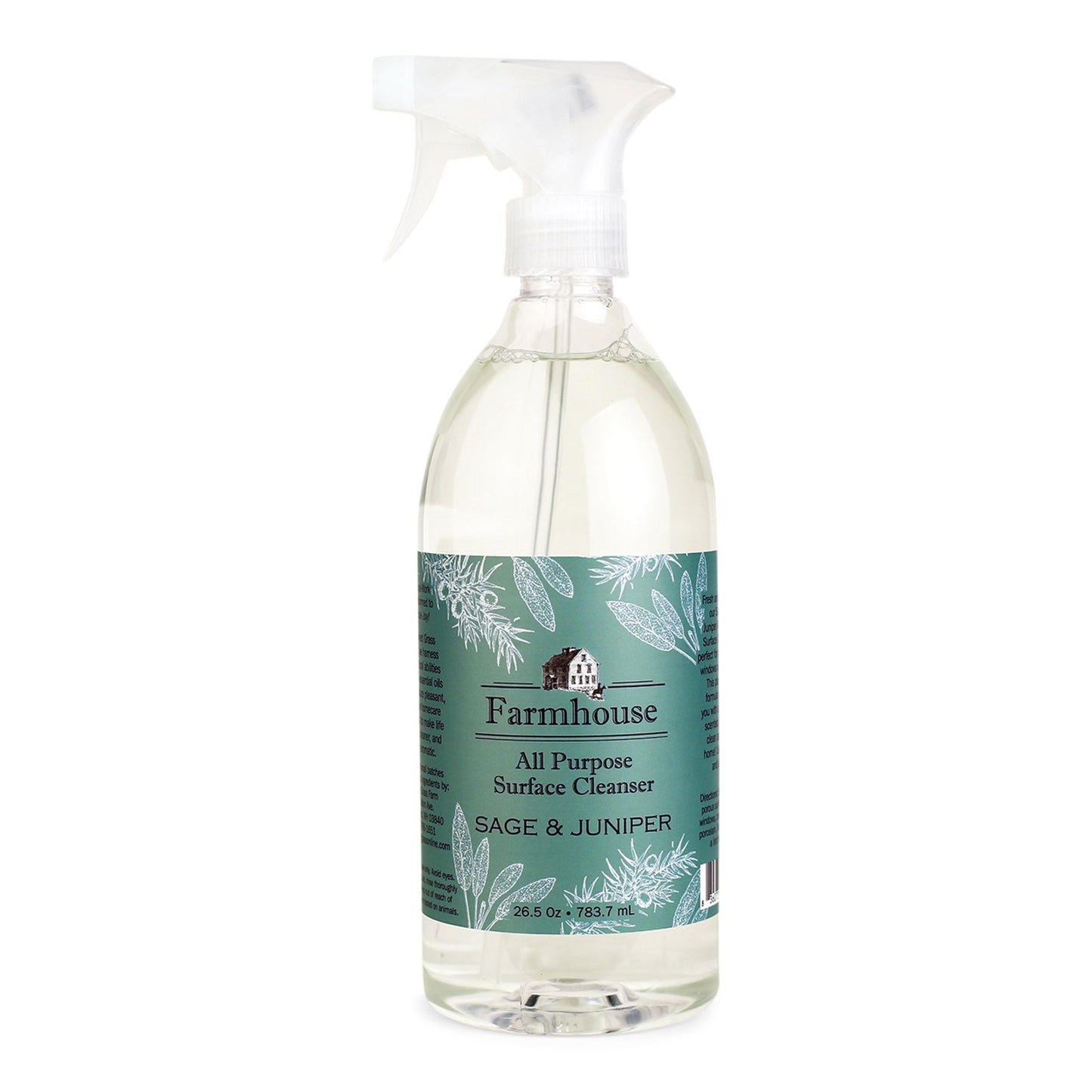A clear spray bottle labeled 'Farmhouse' with 'All Purpose Surface Cleanser' and 'Sage & Juniper' scent, containing a plant-based cleaner.