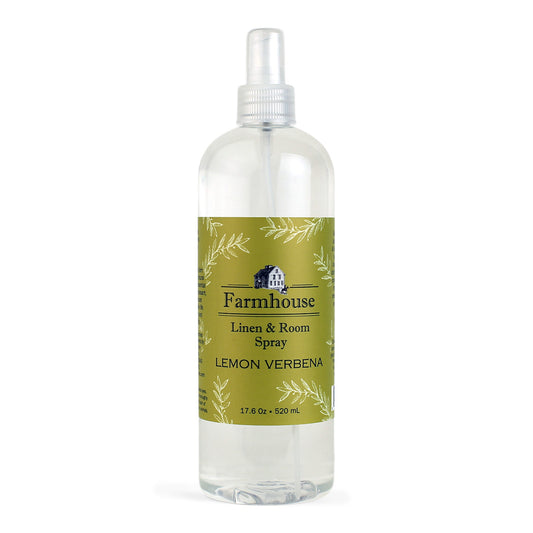 A clear spray bottle labeled 'Farmhouse Linen & Room Spray Lemon Verbena'.