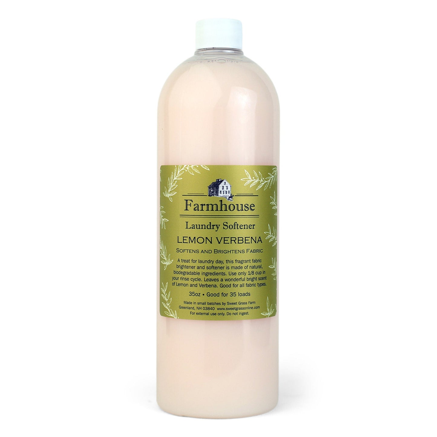 Bottle of Farmhouse Lemon Verbena Laundry Softener with a green label on a white background