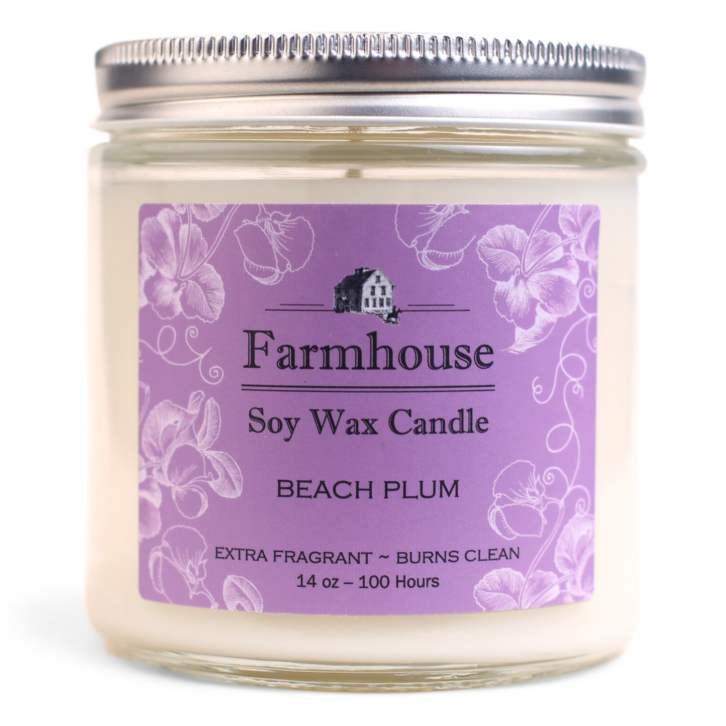 A soy wax candle jar with a label that reads 'Farmhouse Soy Wax Candle, Beach Plum, Extra Fragrant - Burns Clean', with a picture of a house and the brand name 'Sweet Grass Farm'.