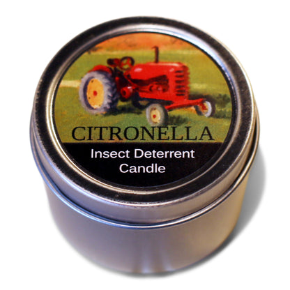 A tin of Gardener's insect deterrent candle with a label featuring a red tractor and the name 'Citronella'.
