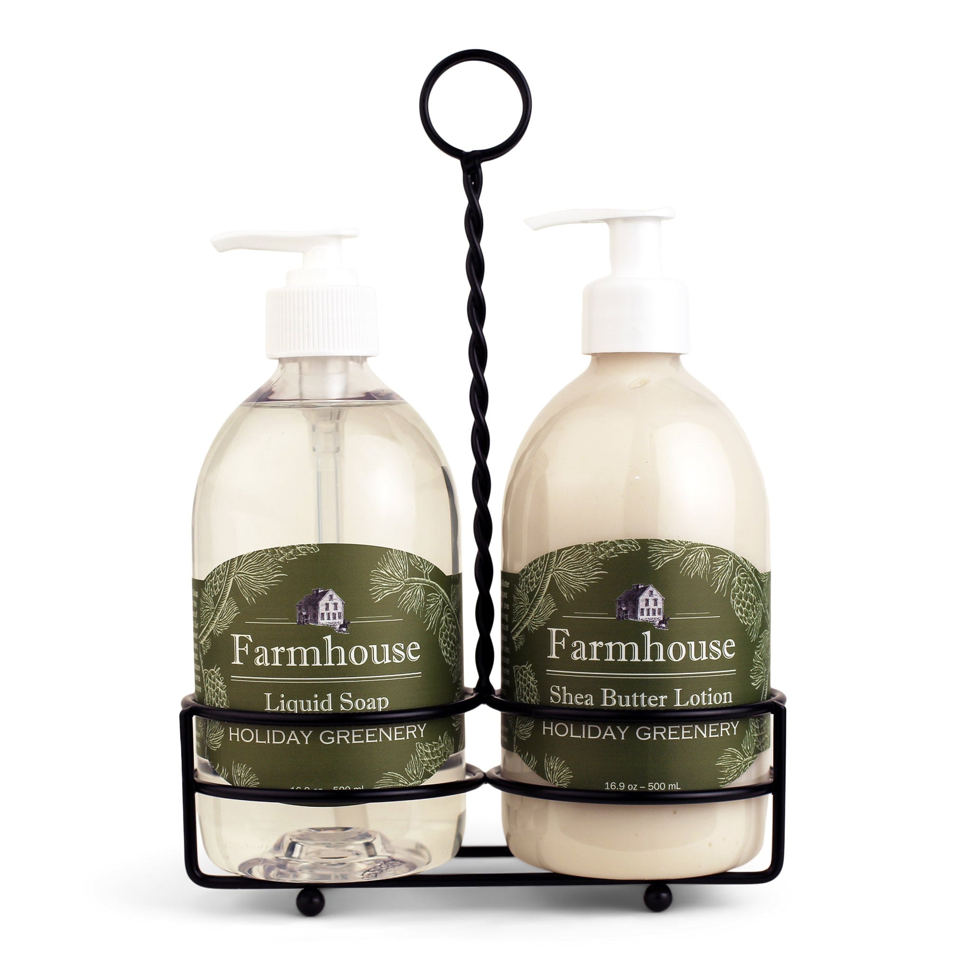 A black metal caddy holding two bottles, one labeled as 'Farmhouse Liquid Soap' and the other as 'Shea Butter Lotion', in Holiday Greenery scent