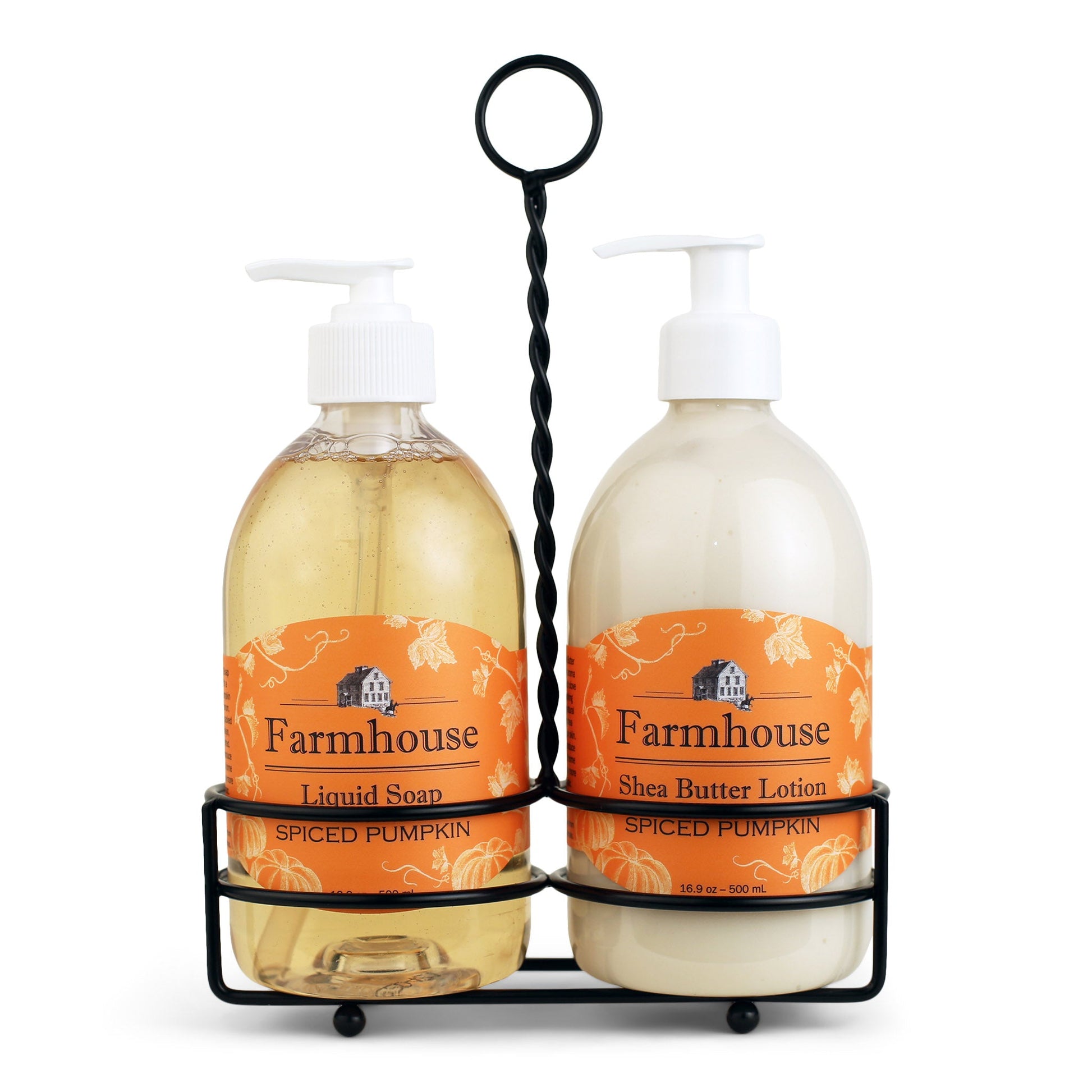 A black metal caddy holding two bottles, one labeled as 'Farmhouse Liquid Soap' and the other as 'Shea Butter Lotion', in Spiced Pumpkin scent