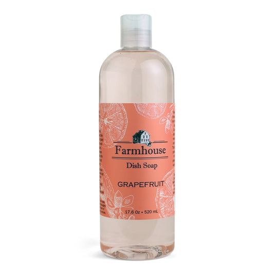 A bottle of Farmhouse dish soap with a orange label and grapefruit scent