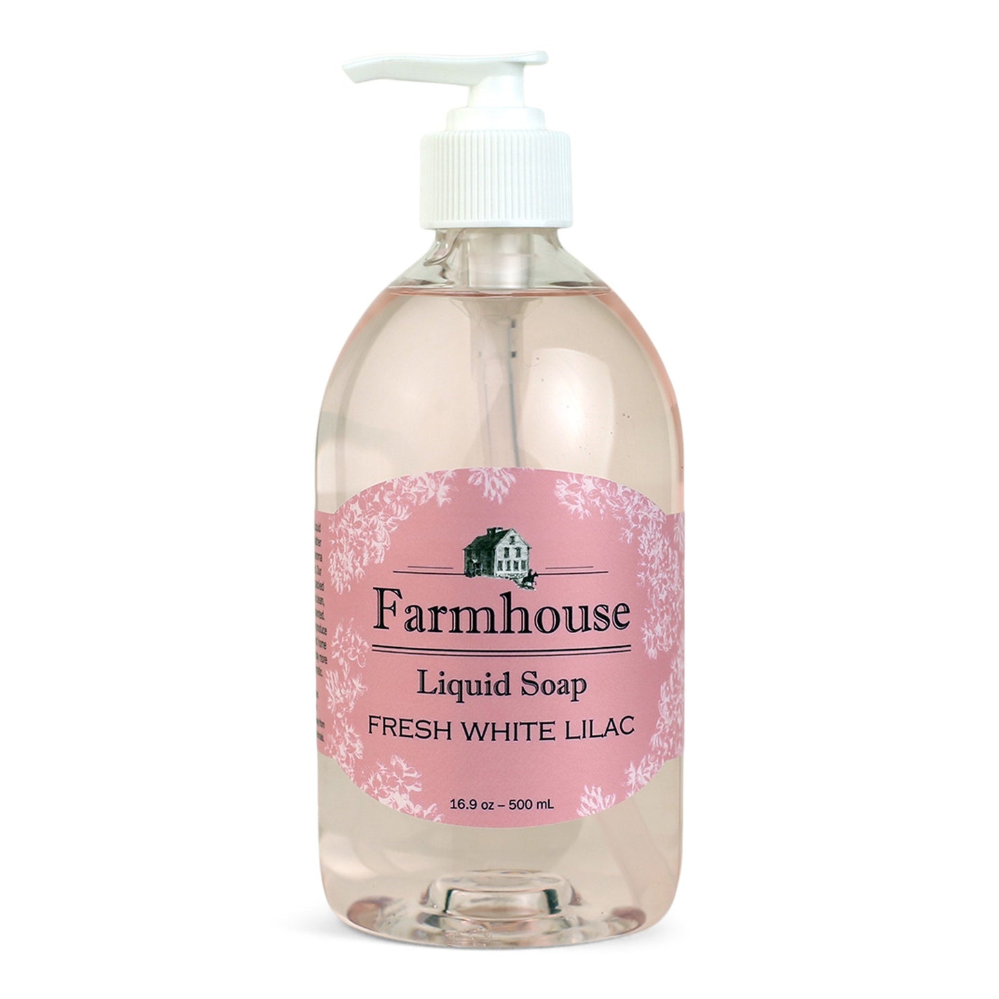 A clear pump bottle of Farmhouse liquid soap with a pink label that reads 'Liquid Soap' and 'Fresh White Lilac'.