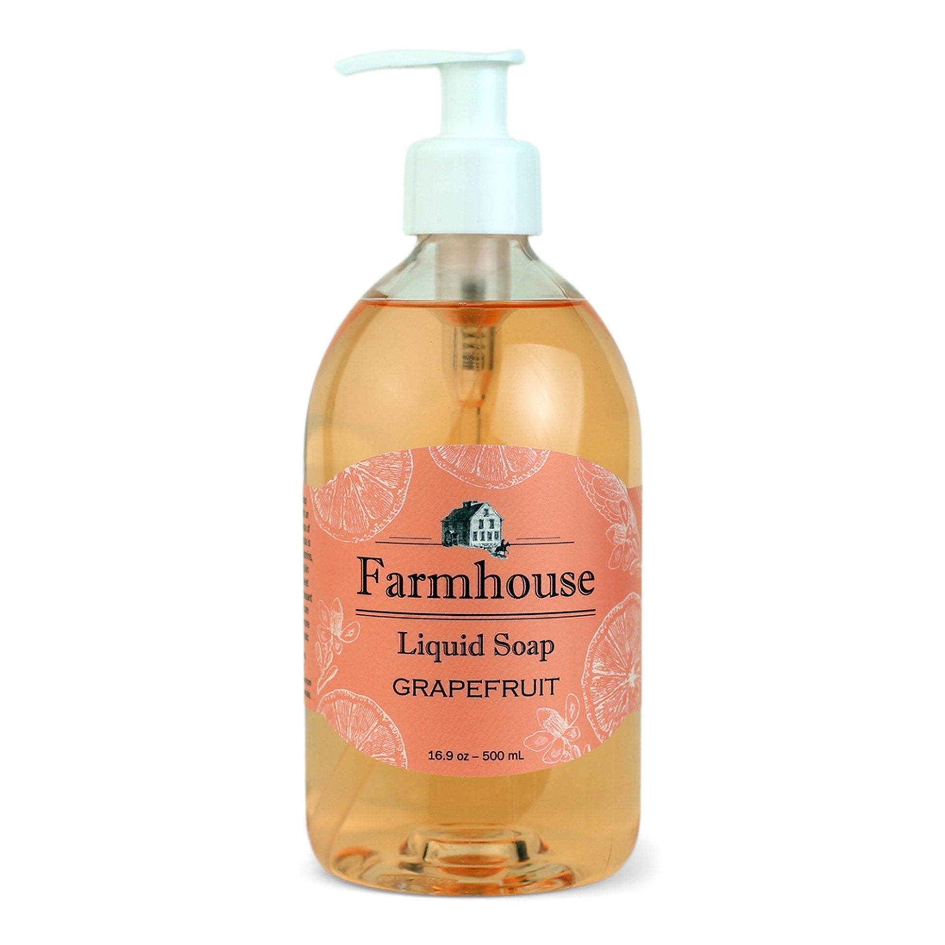 A clear pump bottle of Farmhouse liquid soap with an orange label that reads 'Liquid Soap' and 'Grapefruit'.
