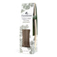 A package of Farmhouse Fragrance Sticks with a holiday greenery scent, featuring a square glass jar and rattan reeds.