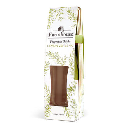 A package of Farmhouse Fragrance Sticks with a lemon verbena scent, featuring a square glass jar and rattan reeds.