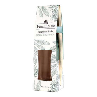 A package of Farmhouse Fragrance Sticks with a sage & juniper scent, featuring a square glass jar and rattan reeds.