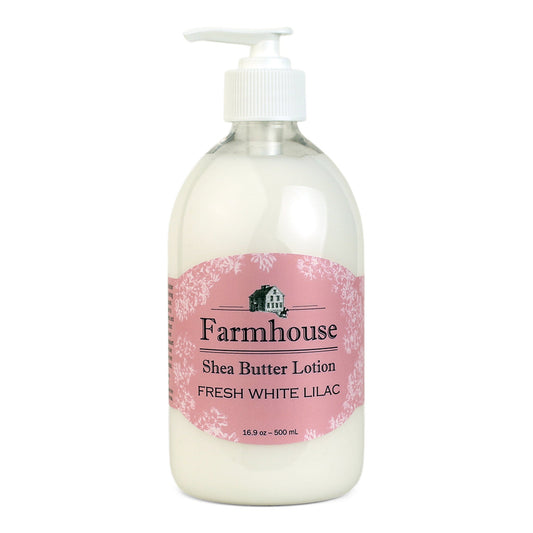 A pump bottle of Farmhouse brand shea butter lotion in Fresh White Lilac scent, with a pink label.