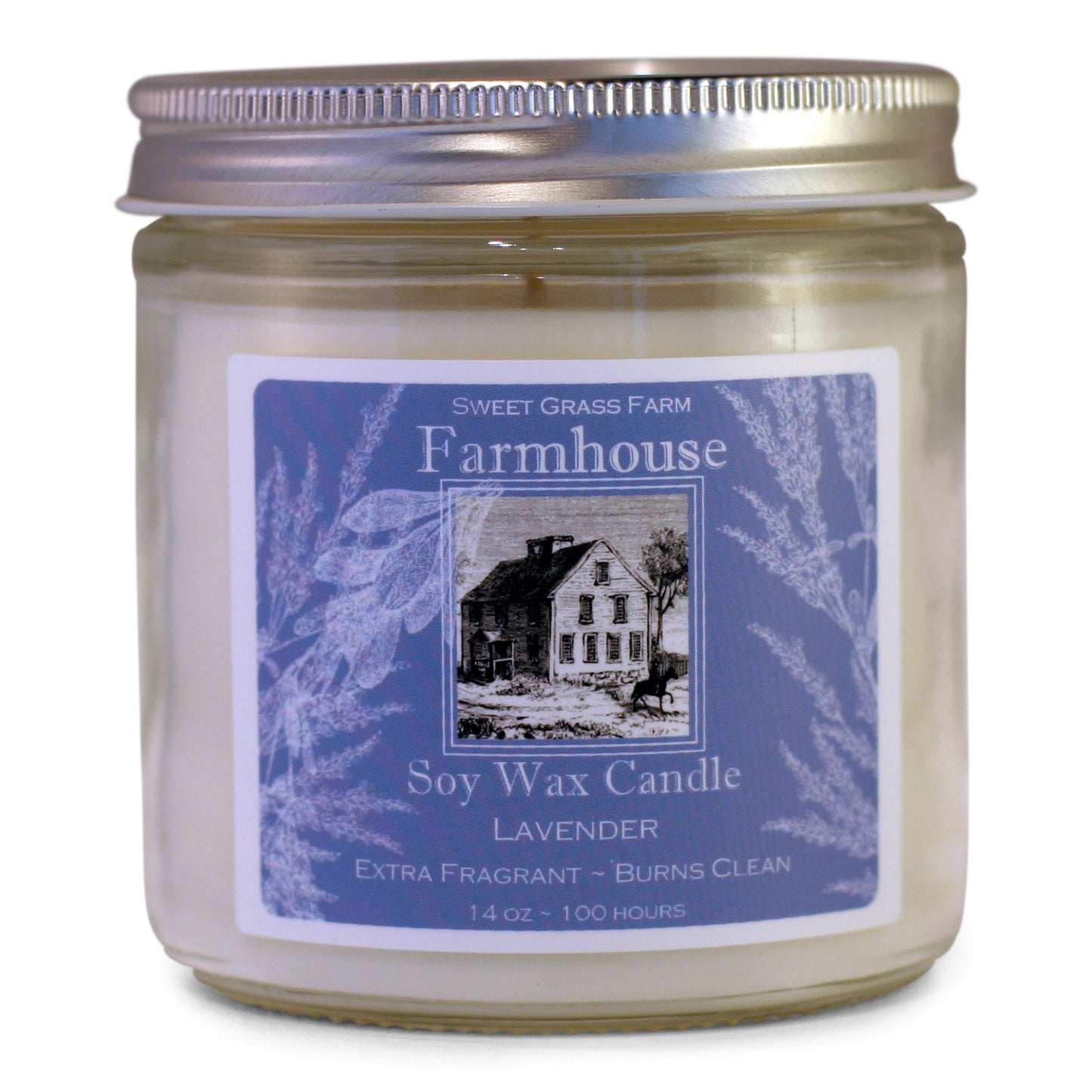 A soy wax candle jar with a label that reads 'Farmhouse Soy Wax Candle, Lavender, Extra Fragrant - Burns Clean', with a picture of a house and the brand name 'Sweet Grass Farm'.