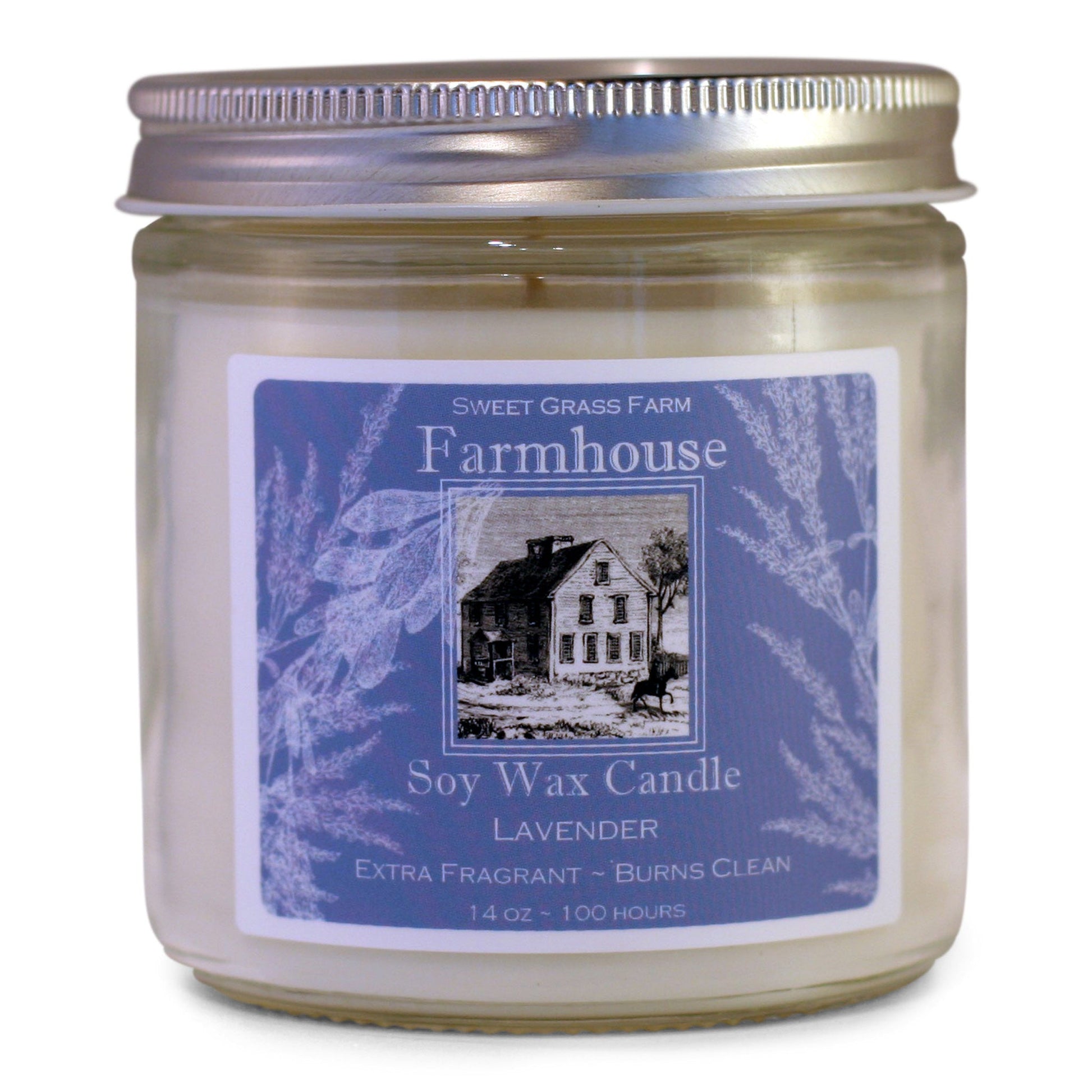 A soy wax candle jar with a label that reads 'Farmhouse Soy Wax Candle, Lavender, Extra Fragrant - Burns Clean', with a picture of a house and the brand name 'Sweet Grass Farm'.