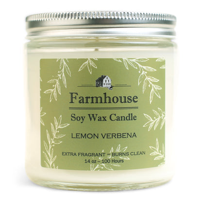 A soy wax candle jar with a label that reads 'Farmhouse Soy Wax Candle, Lemon Verbena, Extra Fragrant - Burns Clean', with a picture of a house and the brand name 'Sweet Grass Farm'.