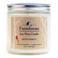 A soy wax candle jar with a label that reads 'Farmhouse Soy Wax Candle, White Birch, Extra Fragrant - Burns Clean', with a picture of a house and the brand name 'Sweet Grass Farm'.