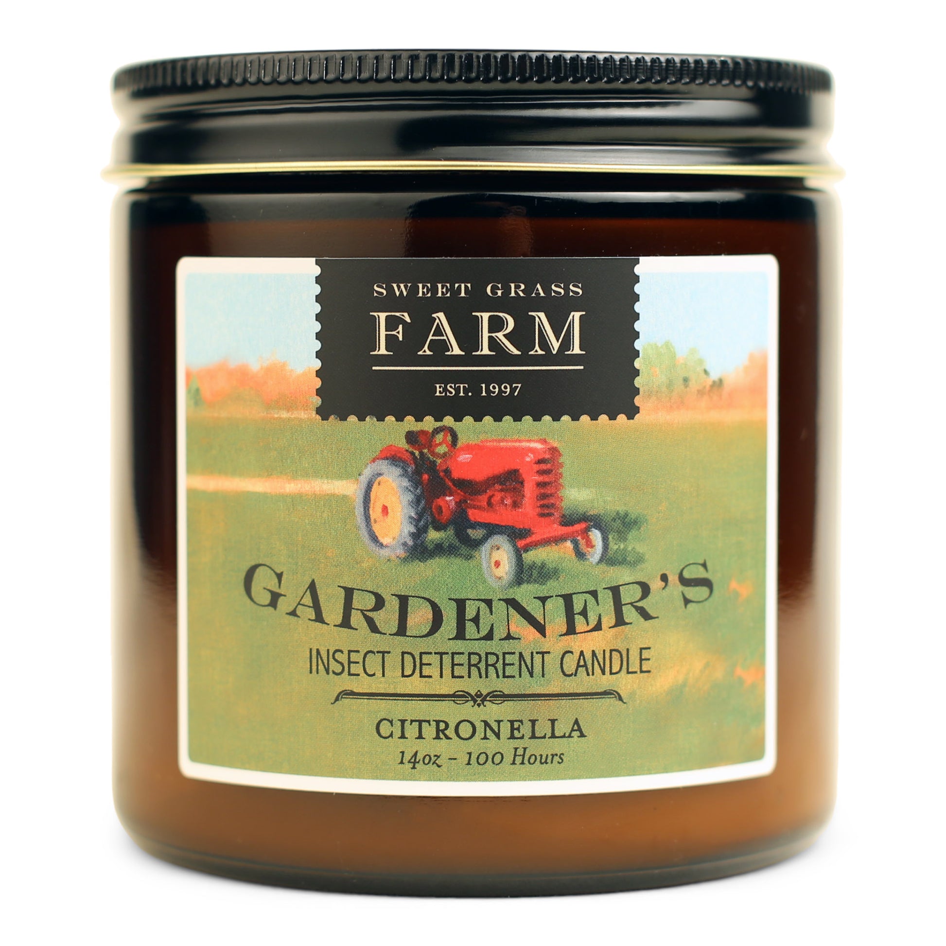 A jar of Gardener's insect deterrent candle with a label featuring a red tractor and the name 'Citronella'.